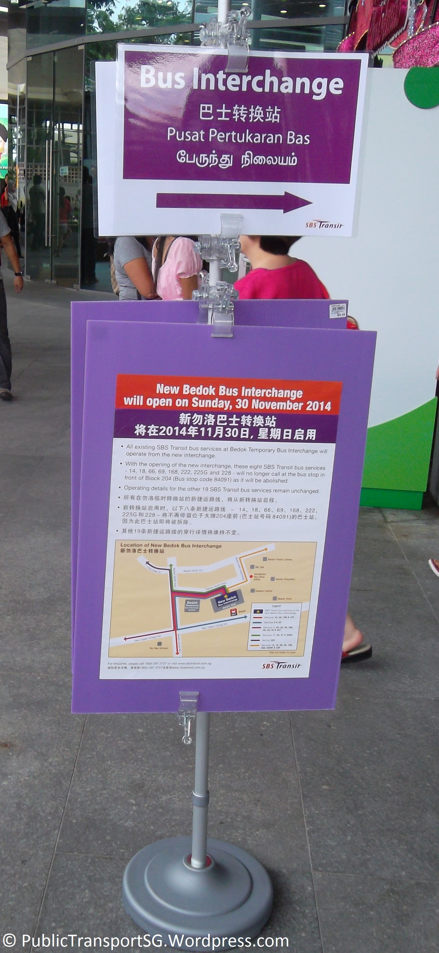 Signboard directing passengers to the new Bedok Bus Interchange