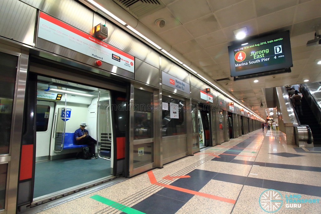 Marina Bay MRT Station - NSL Platform B with a terminating train. Trains to Marina South Pier also use this platform, as indicated on the route maps above the doors
