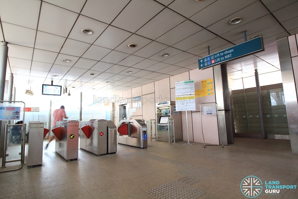 Tanjong Pagar MRT Station - Former Surface Exit I with Faregates and a General Ticketing Machine, leading to lifts that connect straight to platform level (B3). Another lift behind the wall (Lift to shops) connects to Tanjong Pagar Xchange (B1)