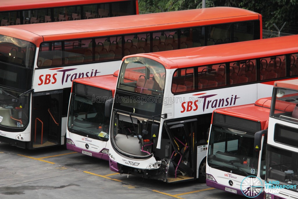 Close-up of damaged buses, featuring a Volvo B9TL damaged while on Service 168