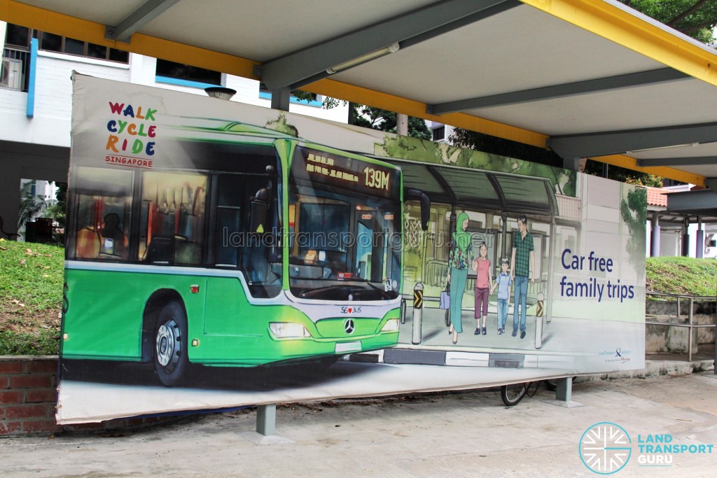 LTA "Walk Cycle Ride" campaign poster featuring an adapted Land Transport Guru photograph