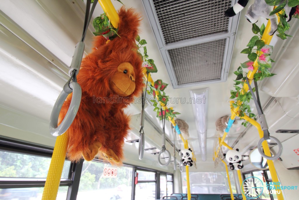 Stuffed orangutan and interior decorations onboard the Mandai Express