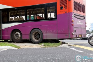 The bus fully mounted the kerb, damaging it in the process