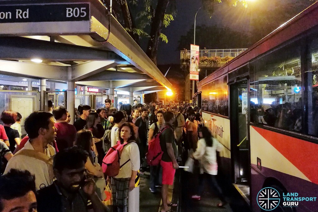 Crowds at Novena Station attempting to board buses