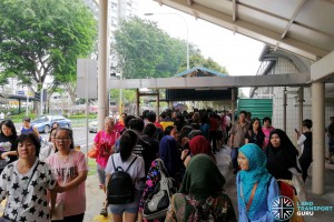 Commuters at Ang Mo Kio queuing for the Rail Bridging Bus service