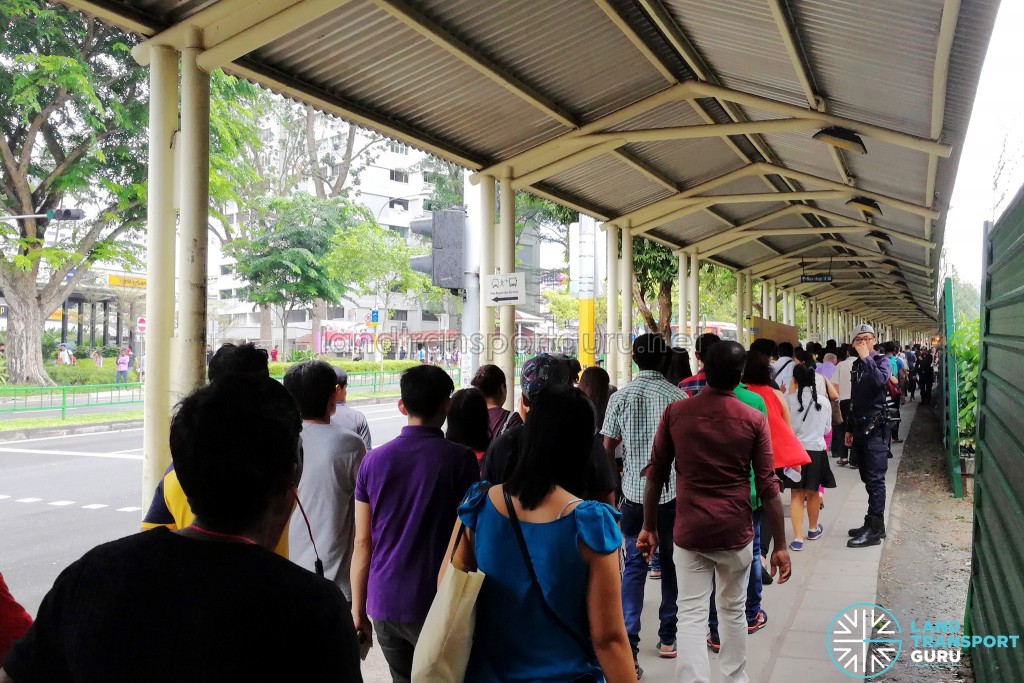 Commuters at Ang Mo Kio queuing for the Rail Bridging Bus service