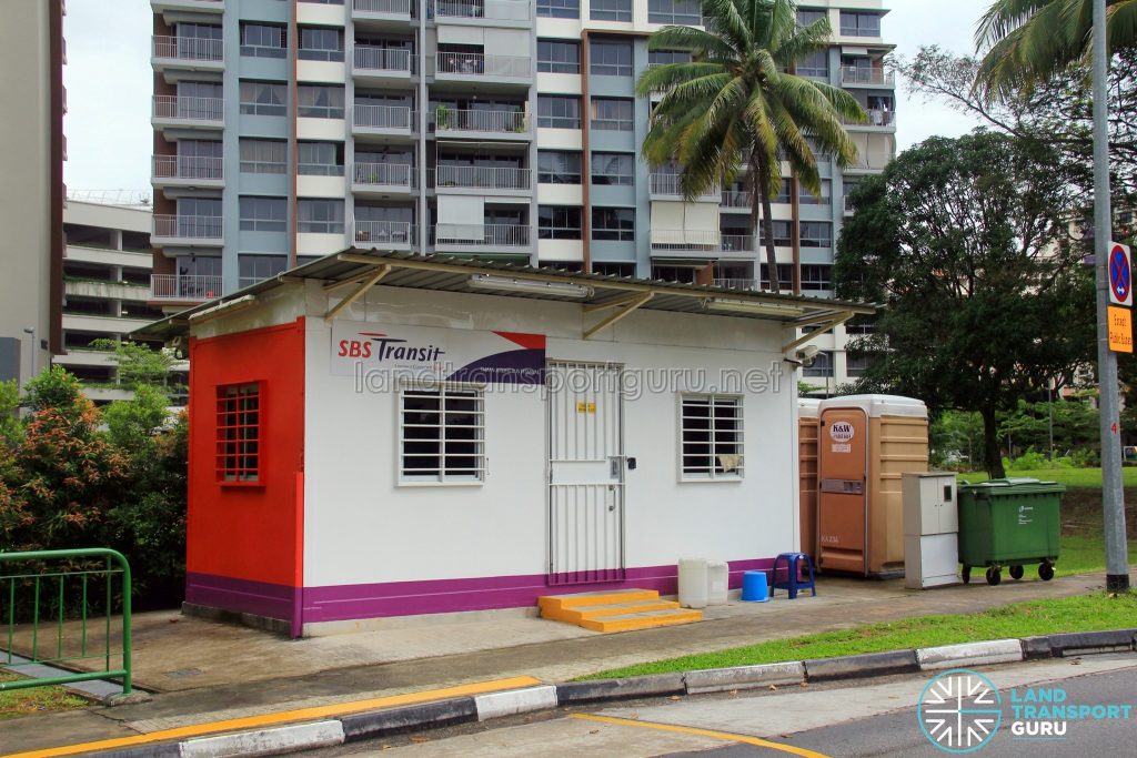 Taman Jurong Bus Terminal - Shipping container office and restroom, with adjacent portable toilet