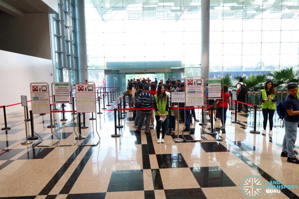Queues for Shuttle 8 and Express 12 at Changi Airport T3