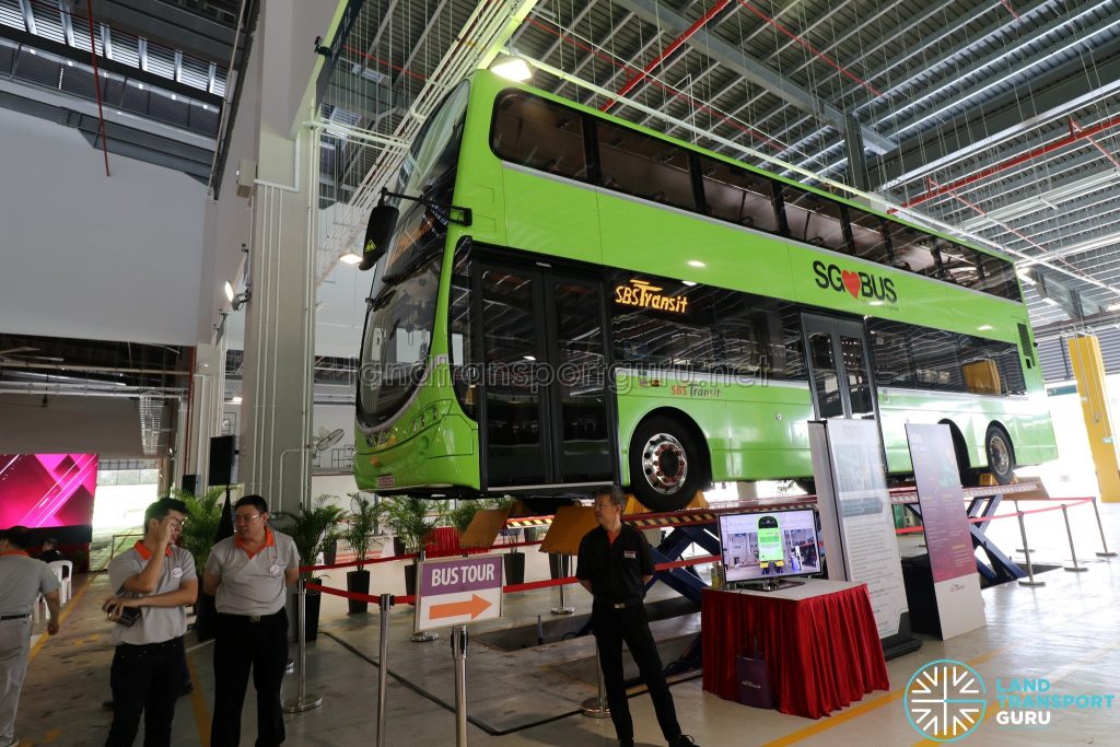 Vehicle Lifting System booth with a Volvo B9TL Wright at the Seletar Bus Depot Carnival